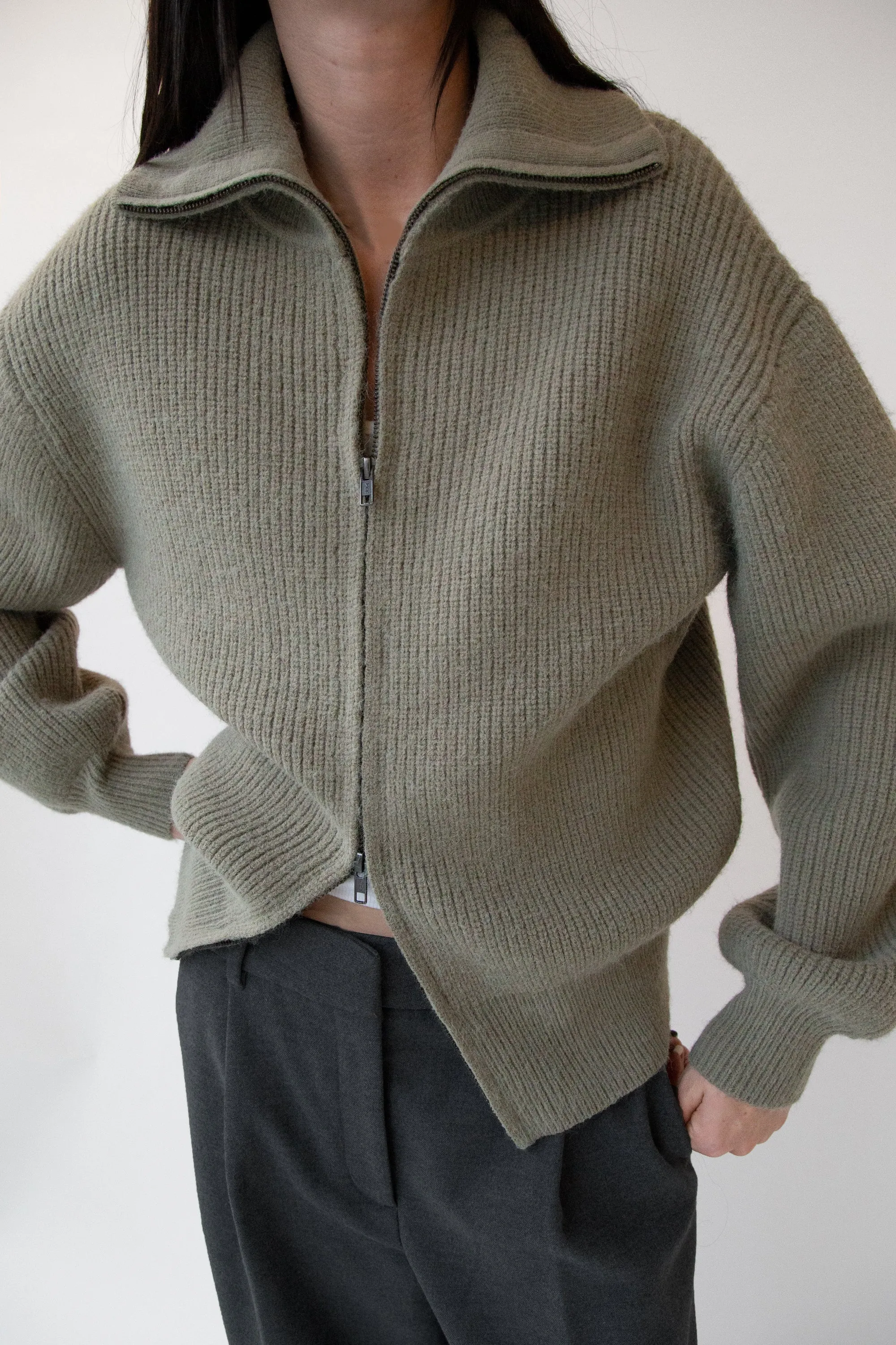 HIGH NECKLINE ZIP UP SWEATER