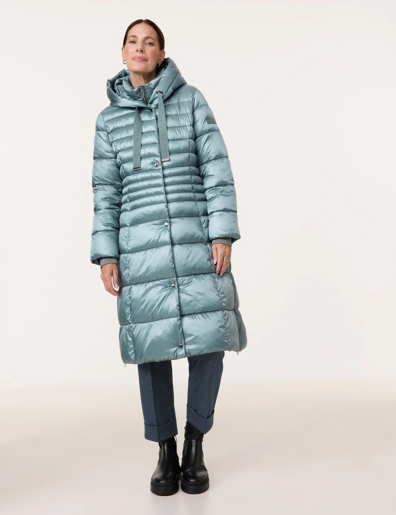 Long quilted coat with an inlay