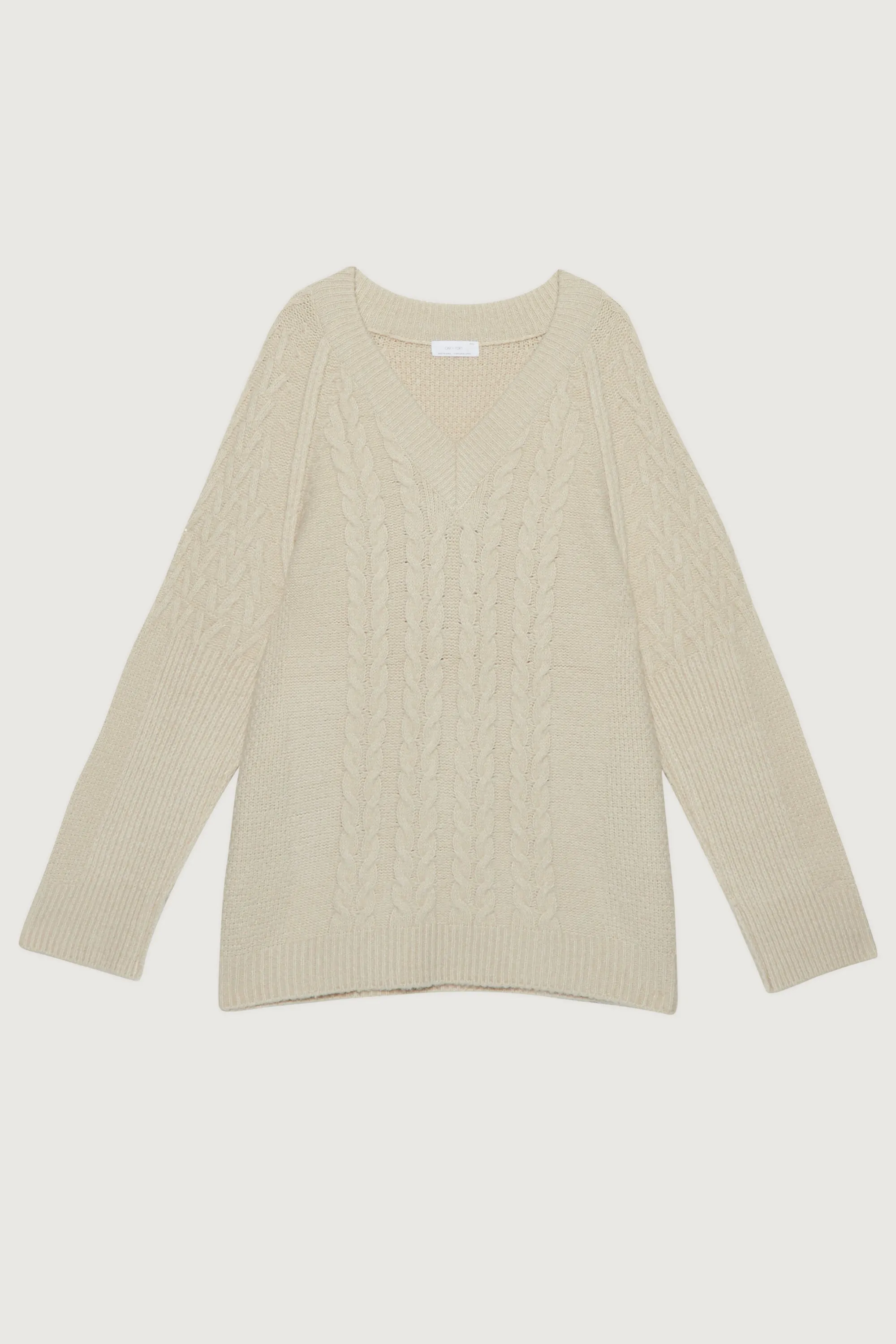 OVERSIZED CABLE KNIT SWEATER